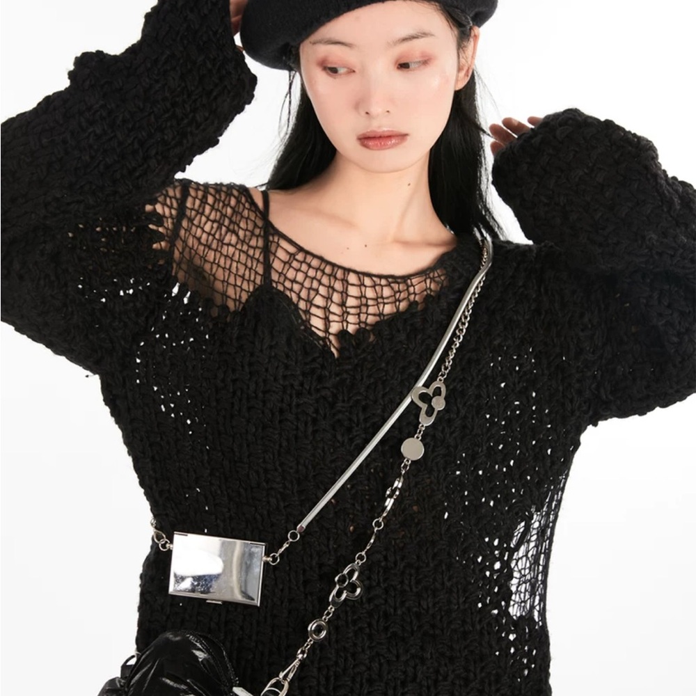 ripped oversize black sweater